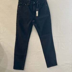 Rolla’s Tim Slim Bonzer Washed Black Jeans